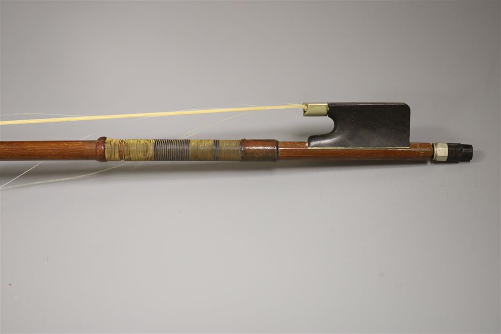 A late 19th century violin and a bow, cased